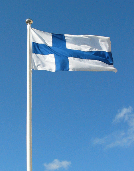 Suomen lippu Suomen lippu liehuu sinistä taivasta vasten