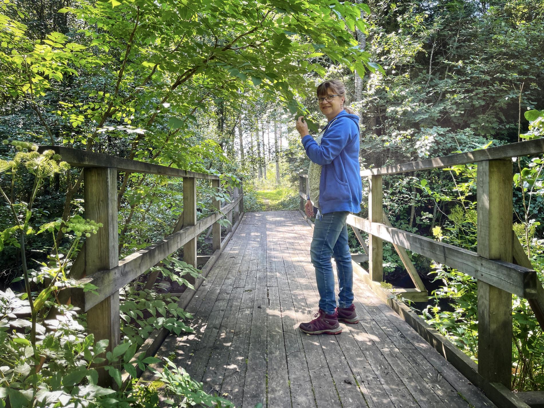 Tita on the wooden bridge over the Haapajoki River.