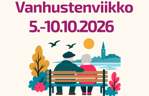 Kaksi henkilöä istuu puiston penkillä