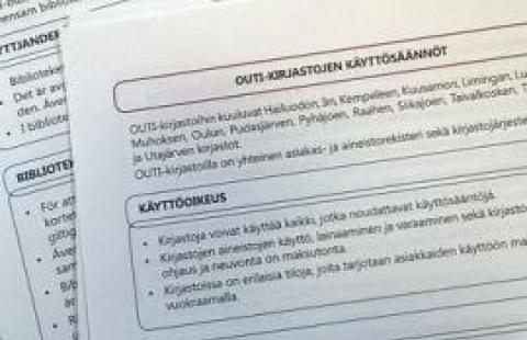 Käyttösäännöt. Kuva: Kaija Asukas. Paperiarkkeja pöydällä suomeksi, englanniksi ja ruotsiksi.