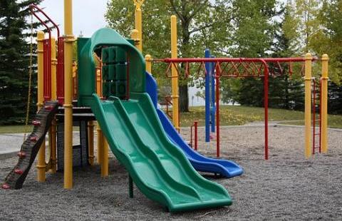 A colorful slide at the playground.