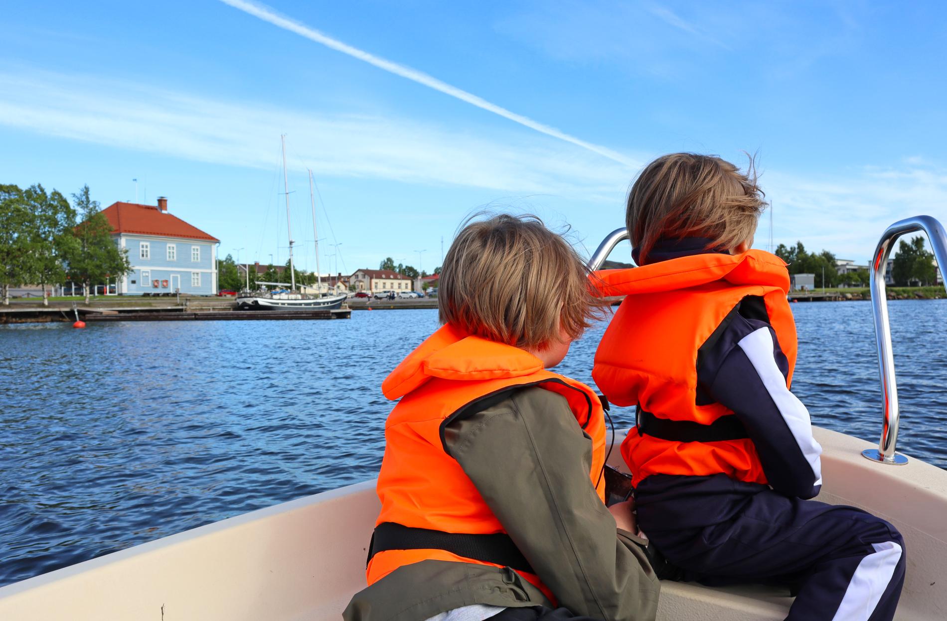 Boating in front of the Packhouse Museum.