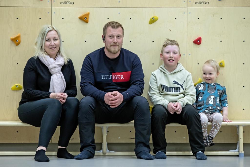 A family photo of the Kyröläinen family of four.